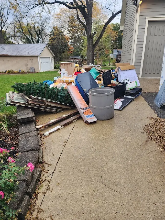 Dumpster being loaded with debris for Residential Dumpster Rental in Aberdeen